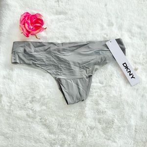 New with tags DKNY THONG PANTY GREY  sz small . NO PANTYLINES. Super soft!